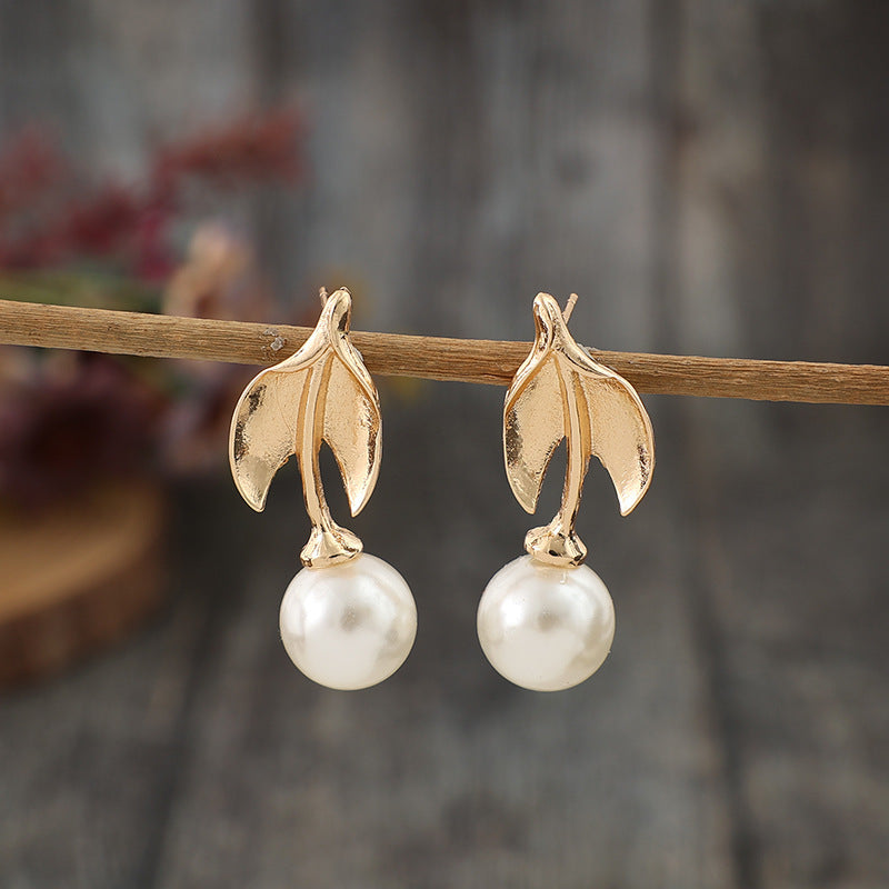 Bohemian-style Leaf-wrapped Pearl Alloy Long Earrings