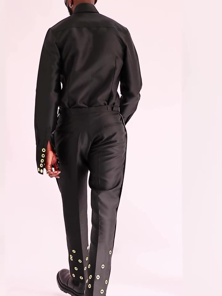 Chic Black Formal Ensemble With Adjustable Eyelet Trim And Structured Silhouette